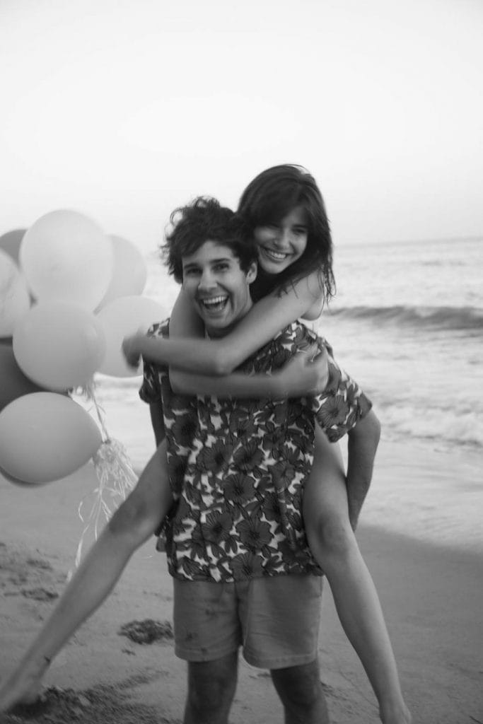 David Dobrik​ and lady friend - giving piggyback ride.#DavidsPerfume COURTESY OF DAVID’S PERFUME/FLOWER SHOP PERFUMES CO.